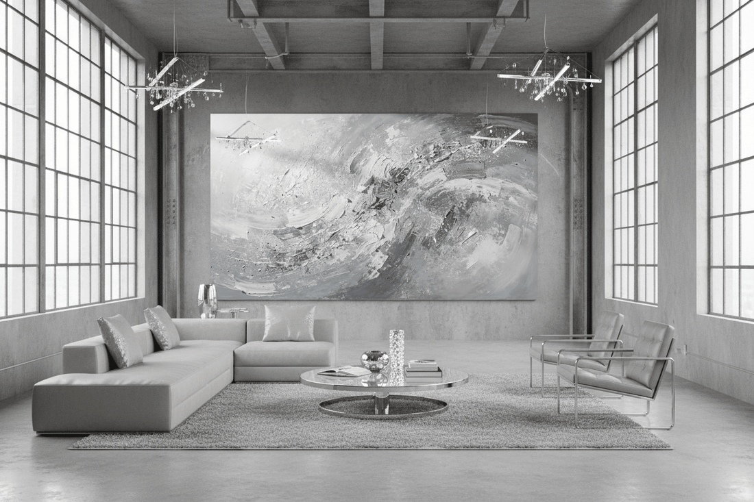 Silver Storm monumental abstract artwork installed across a wide wall in a modern industrial loft