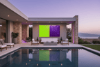 Acid Divide lime and indigo artwork in a pool lounge and outdoor living space