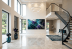 Frequency Drift abstract geometric artwork with teal, violet, silver and black crossing planes in a luxury two story foyer