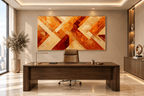 Golden Convergence abstract geometric artwork with amber, crimson, gold and cream diagonal bands in an executive office