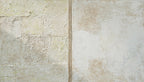 Masonry Interval abstract artwork with granular cream and limestone blocks, a narrow vertical stone seam, and a pale grey chalk field