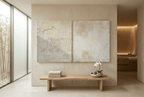 Masonry Interval abstract artwork with granular cream and limestone blocks, a narrow vertical stone seam, and a pale grey chalk field in a wellness spa