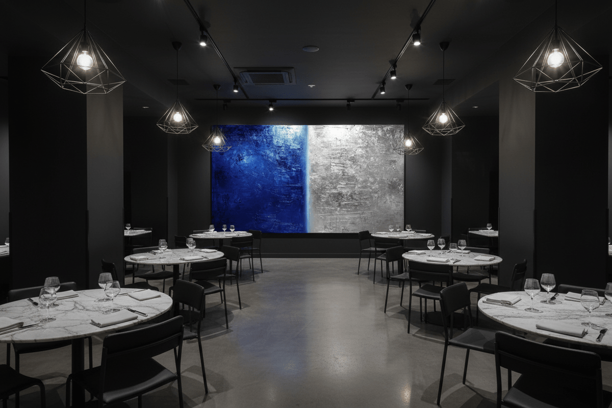 Midnight Steel ink-blue and silver artwork in an upscale restaurant interior