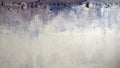 Overburden abstract artwork with a dark slate-violet plaster-like accumulation and fine drips above a chalk-white field with pale blue-grey veils