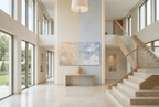 Pale Confluence panoramic abstract artwork with soft peach and shell-pink plaster-like texture at left dissolving into a powder-blue, dove-grey and chalk-white field in a two story foyer