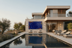 Ultramarine Ember Limited Edition monumental blue and ember-orange abstract artwork in an outdoor pool area of a luxury modern residence